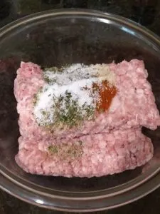 pork and seasonings in bowl before mixing