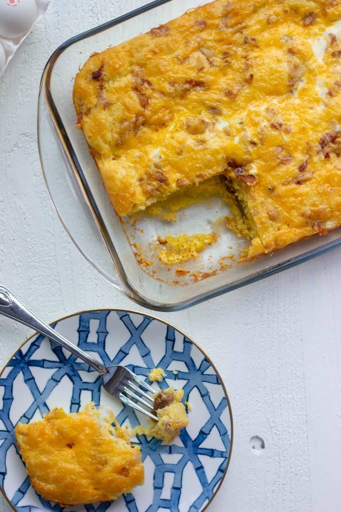 A keto breakfast casserole with bacon, sausage, egg, cheese, and a buttery keto friendly bread. Perfect for meal prep and just 3.5 net carbs per serving!