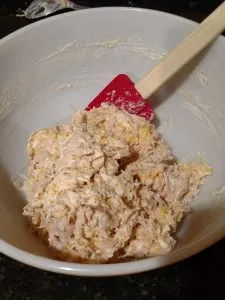 chicken and cheeses mixed in bowl